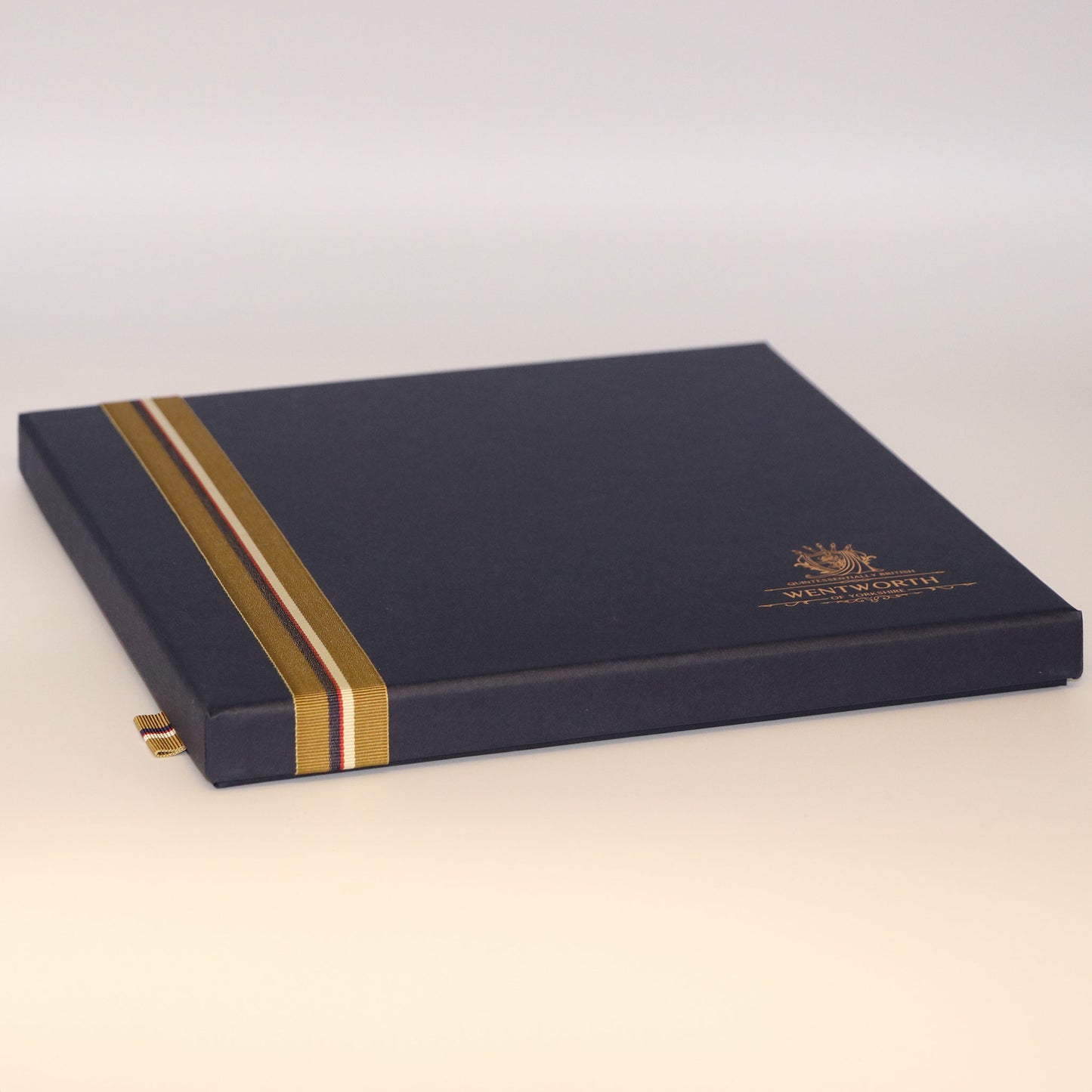 Presentation, gift box for silk scarf shown closed.