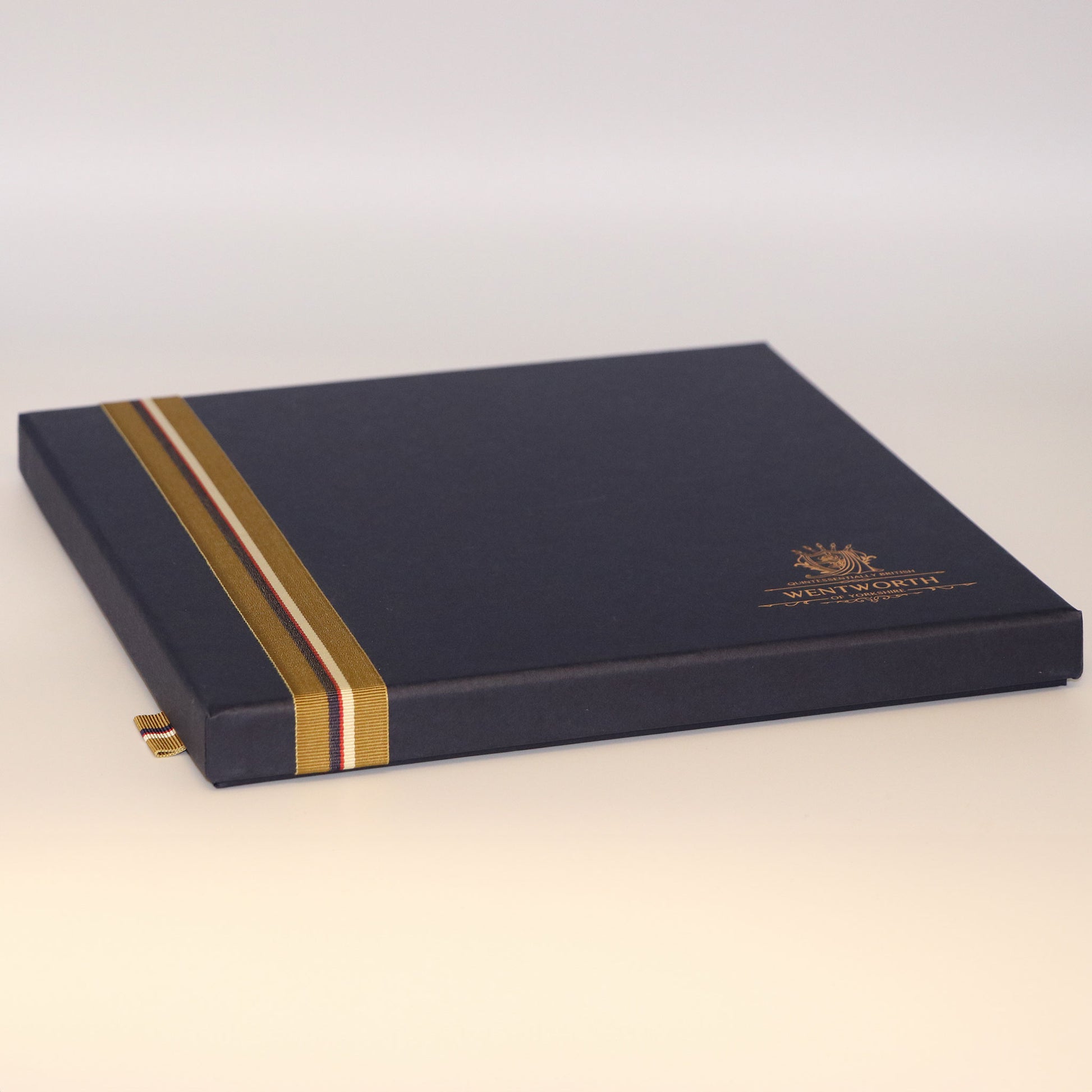 Presentation, gift box for silk scarf shown closed.